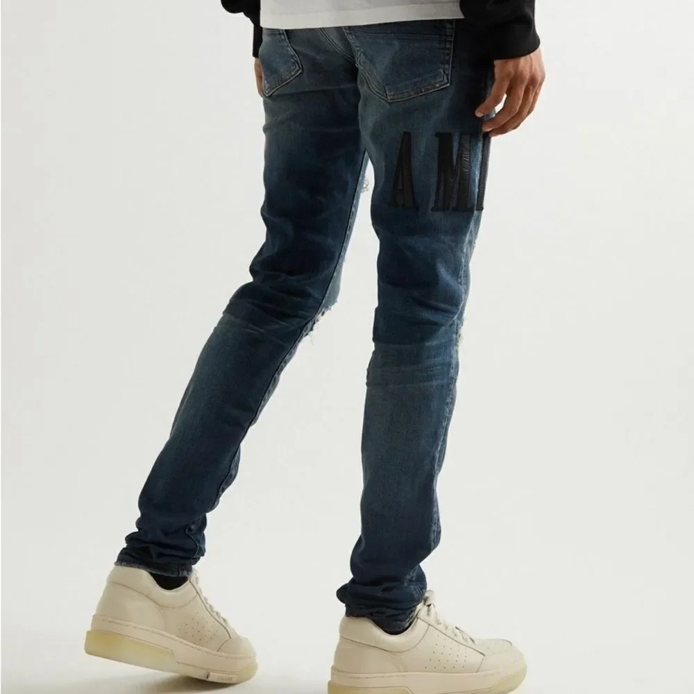 AMIRI Skinny-Fit Leather Appliquéd Distressed Jeans Blue/Black 32 NWT